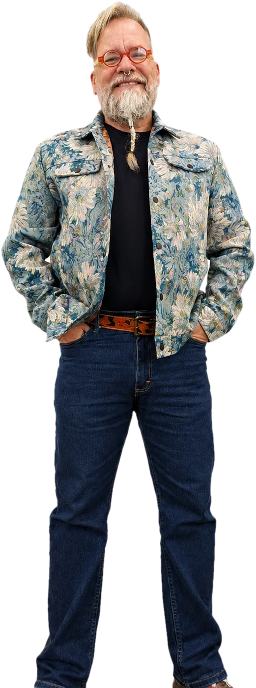 Robert McDiarmid in a tapestry jacket and jeans